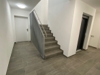 Neubau - 4 Zimmer-Erdgeschoss-Wohnung mit Balkonterrasse in Nettetal-Lobberich - Treppenhaus-Aufzug
